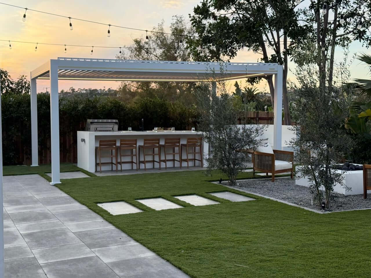 BON Pergola installed adjacent to an outdoor kitchen area