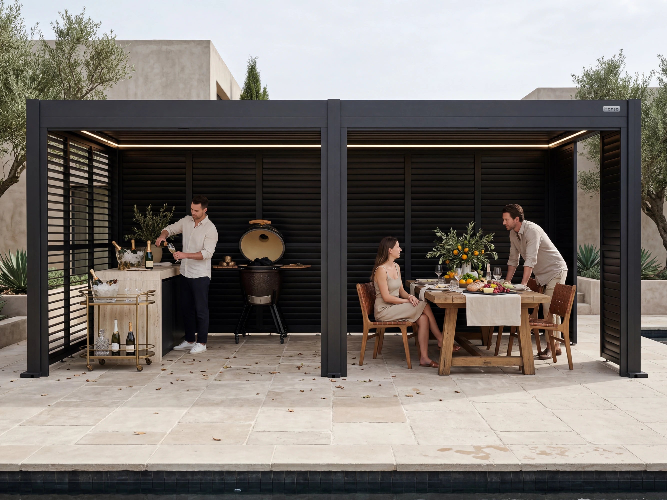 Hanso Horizon 13x19 dual-span pergola installed over a luxury outdoor kitchen and pool, showing the slim aluminum frame and louvered roof