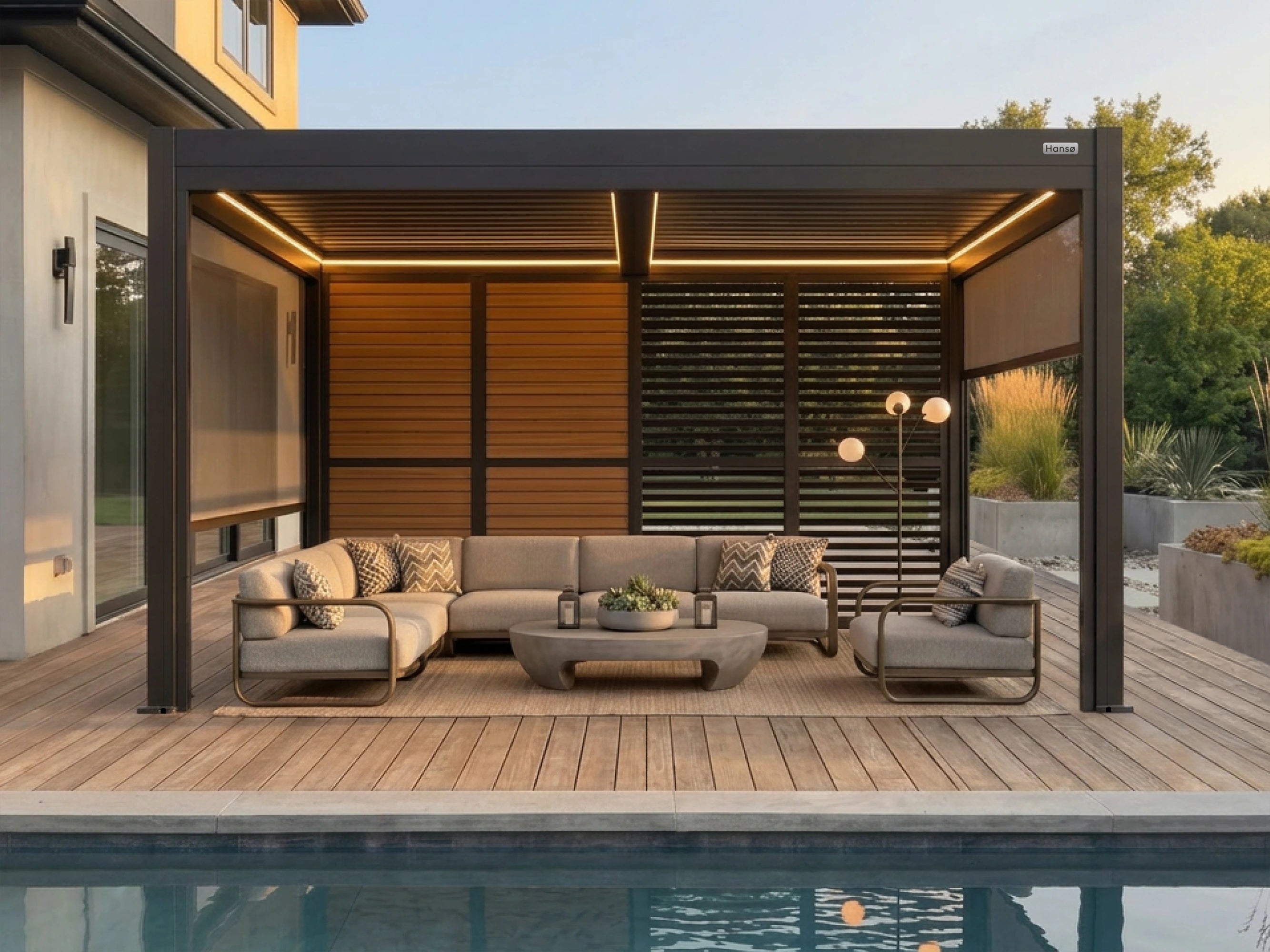 Hanso Horizon in white finish at a poolside lounge area during sunset with integrated LED lighting